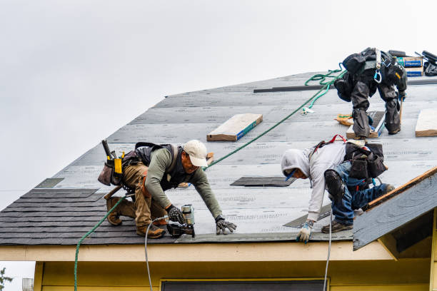 Professional Roofing technician working in Nashua, NH